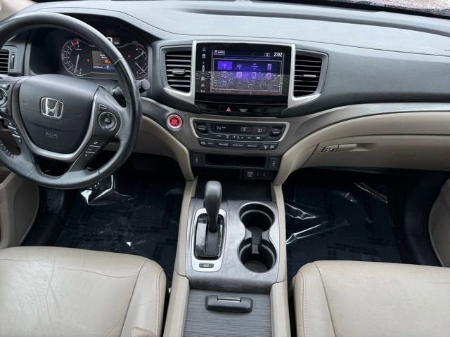 Used 2018 Honda Pilot EX-L with VIN 5FNYF6H50JB064479 for sale in Rochester, Minnesota