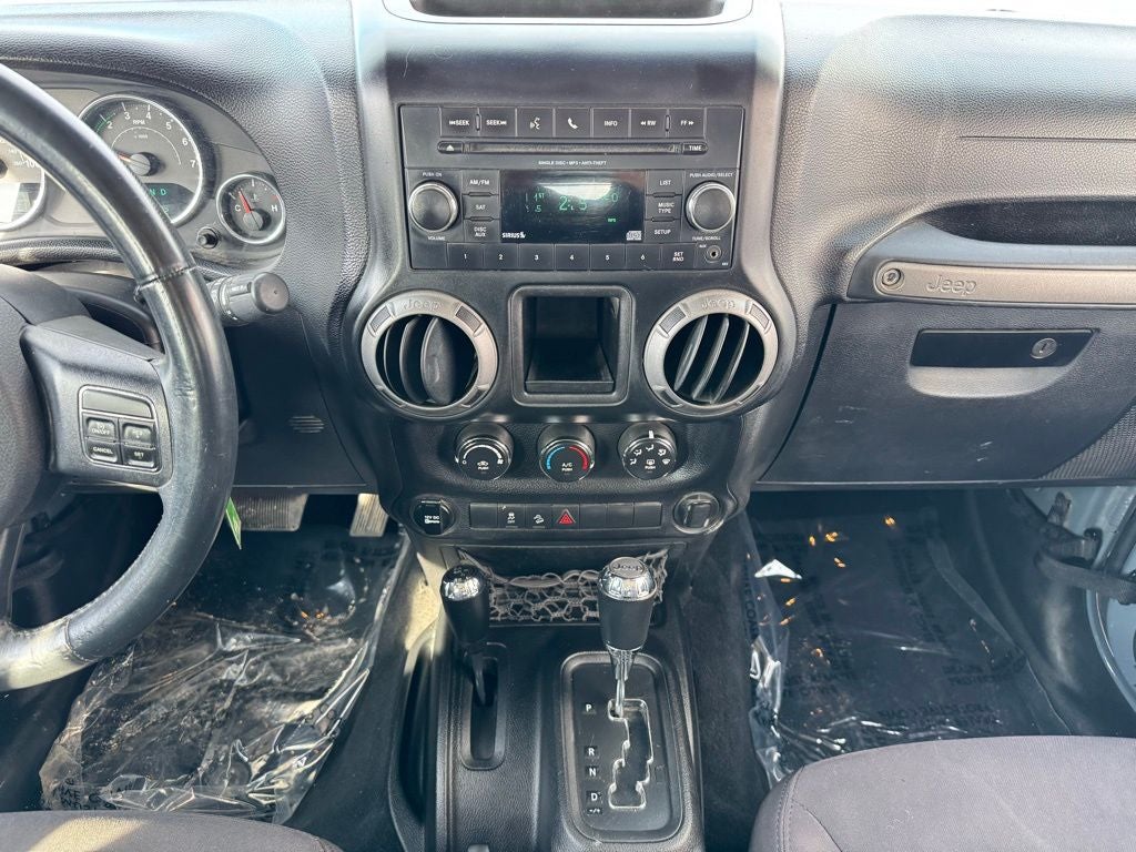 Used 2014 Jeep Wrangler Sport with VIN 1C4AJWAG5EL138879 for sale in Rochester, Minnesota