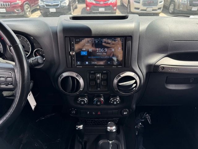 Used 2015 Jeep Wrangler Unlimited Sport with VIN 1C4BJWDG4FL506373 for sale in Rochester, Minnesota