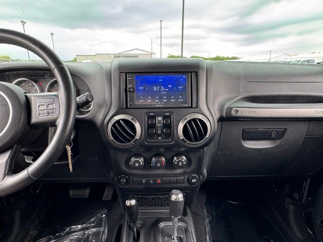 Used 2015 Jeep Wrangler Unlimited Sport with VIN 1C4BJWDG7FL550089 for sale in Rochester, Minnesota